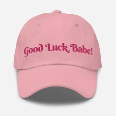 Good Luck Babe! Chappell Embroidered Dad hat Low profile with an adjustable strap and curved visor. * 100% chino cotton twill * Green Camo color is 35% chino cotton twill, 65% polyester * Unstructured, 6-panel, low-profile * 6 embroidered eyelets * 3 ⅛" (7.6 cm) crown * Adjustable strap with antique buckle * Blank product sourced from Vietnam or Bangladesh Good Luck Babe! Chappell Embroidered Dad hat. Perfect for the Midwest Princess Tour. Stop the world just to stop the feeling.  This product is made especially for you as soon as you place an order, which is why it may take us a bit longer to deliver it to you. Making products on demand instead of in bulk helps reduce overproduction, so thank you for making thoughtful purchasing decisions! Midwest Princess, Camo Colors, Green Camo, Dad Hat, Trucker Cap, Dad Hats, Good Luck, Cotton Twill, Low Profile