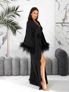 Long silk robe is made of high-qualiry silk satin. It has long wide sleeves made of lace and wide belt.  Boa natural ostrich feathers! Black satin kimono robe When you have one of the most important days in your life, everything should be perfect! You probably planned every minute of this day and now you are ready to make it real. The perfect day starts from the very morning in our White bride robe which will be remembered every time you will look at your photos.  Ostrich feather robe Boudoir feather robe Long bridesmaid robe   Gothic wedding gift for bride, Сhristmas gift The bride robe should be beautiful and comfortable at the same time so you could enjoy this day in full! Just imagine yourself wearing a soft, silk robe which is embracing you and gives you the feeling that you are a sta Satin Wrap Kimono For Party, Long Sleeve Feather Robe For Parties, Elegant Robe With Feather Trim For Wedding Night, Elegant Satin Finish Kimono For Party, Elegant Satin Robe With Feathers, Elegant Feathered Evening Robe, Long Summer Party Robe, Chic Long Sleeve Sleepwear For Parties, Party Satin Kimono With Satin Finish