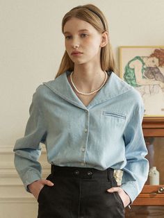 Editor's Notes The denim shirt has a unique marine collar and a basic silhouette with a classic design. - Fake lip pocket at the chest- Colored embroidery at the waist- Casual, comfortable fitMeasurements(in.)ONE SIZE- Total Length: 22.05 in.- Shoulders: 18.7 in.- Chest: 21.65 in.- Sleeve Length: 22.05 in.- Sleeve Width: 12.99 in.Model info: Height 5' 7.5, Bust 30 in., Waist 23 in., Hips 35 in.Composition & Care- 100% Cotton- Dry cleaning recommended- Machine washing at a high temperature may cause discoloration and deformation- Do not use bleach- Store in a cool, low humid area- Steam ironing recommended- Wash the fabric that may stain separately- Avoid bright colored clothes or accessories for dark colored clothes that may stain- Remove or cover buttons or zippers when Fake Lips, Trendy Shirt Designs, Bright Colored, Covered Buttons, Denim Shirt, Collar Shirts, High Temperature, Mens Bottom, Classic Design