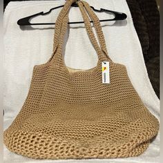 Brand New Water With Tags Brown Summer Hobo Bag With Adjustable Strap, Brown Hobo Bag With Adjustable Strap For Summer, Light Brown Crochet Bag For Vacation, Lightweight Brown Shoulder Bag For Everyday, Everyday Light Brown Summer Straw Bag, Lightweight Brown Bag For Everyday Use, Lightweight Brown Shoulder Bag For Travel, Gold Straw Bag With Double Handle For Everyday Use, Lightweight Rectangular Brown Shoulder Bag