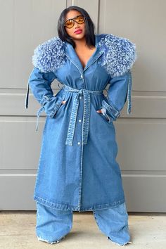 Description: Turn heads in this luxury Trench coat, crafted out of a mid weight denim fabric with an oversized fit. This coat features an exquisite exaggerated detachable mongolian fur collar. The trench is complete with a front button closure, detachable waist belt and side pockets, creating a sophisticated and stylish silhouette. The shoulder epaulettes can be fastened or unsnapped for added versatility. This outerwear is sure to keep looking chic and polished. PRE ORDER, ESTIMATED SHIP DATE 9/15-9/21. RESERVE YOURS NOW. 100% Cotton, 100% Mongolian Fur Medium denim wash. Measurements guide: This coat as an oversized fit. Product Measurements Length Bust Label Size US Size IN IN S 4-6 49.80 40.16 M 8 50.39 41.73 L 10 50.98 44.88 XL 12-14 51.57 48.03 2XL 14-16 52.17 51.18 3XL 16-18 52.76 5 Western Chic Outfits, Shoulder Epaulettes, Mongolian Fur, Denim Trench Coat, Blue Trench Coat, Western Chic, African Girl, Fall Style, Fur Collar