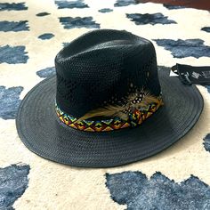 Beautiful Black Straw Hat. Colorful Fabric Band And Feather Detail. Brand New - Never Been Worn. Black Western Sun Hat With Curved Brim, Black Western Panama Hat With Short Brim, Black Western Sun Hat For Festivals, Western Black Panama Hat With Short Brim, Black Western Style Sun Hat For Festivals, Black Brimmed Fedora For Summer, Black Summer Fedora With Curved Brim, Black Flat Brim Fedora For Summer, Black Western Style Festival Sun Hat