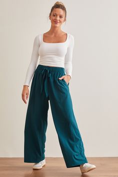 These wide-leg nylon pants offer unrestricted movement and a breezy feel, perfect for warming up or cooling down in style. The bow waistband adds a touch of personality, making them a versatile addition to your athletic wardrobe. Media Day, Nylon Pants, Warming Up, Wide Leg Pant, Active Leggings, Altar'd State, In Style, Wide Leg Pants, Active Wear