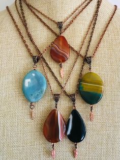 Oval and  pear shaped crystal Agate Stone  pedants.  Has a copper feather dangling at bottom copper bail and 21"chain with 2" extra. This are great thumb worry stones hanging right on your neck! Style A21 Please check out our other items as some are complimentary to this item. If you buy 2 or more items you will get 15% off! Spend $50 and get 20% off. We can ship multiple items for one normal shipping cost. We take custom order requests as well. Worry Stones, Stone Pendant Necklace, Stone Pendant, Agate Stone, Stone Pendants, Pear Shaped, Crystal Necklace, Stone Color, Agate