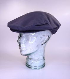 FREE SHIPPING The classic cap suitable for everyone and compliment many styles. The dark navy lightweight canvas cotton is a perfect neutral and will be excellent for your summer wardrobe. It can be washed in cold water and laid flat to dry. The brim board is made from compressed polystyrene and can be molded with your hands to create the curve to your liking. This handmade hat will be in your wardrobe for years to come. This hat is a size 7 or 56 cm The proper fit should be snug without being tight and if you put a finger between your head and the hat while it is pulled down it makes it too tight. It's very important to measure your head correctly.  There are a few things that you need. Please visit our website www.littlehatshop.com , Measuring Heads Page for more information. *A flexible Navy Cotton Brimmed Hat, Cotton Brimmed Baseball Cap For Outdoor, Cotton Flat Cap For Outdoor Use, Cotton Flat Cap For Outdoor, Classic Navy Hat For Outdoor, Classic Navy Outdoor Hat, Classic Navy Flat Cap, Navy Cotton Hat With Short Brim, Blue Cotton Flat Cap