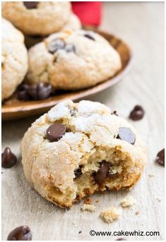 chocolate chip cookies on a plate with one broken in half