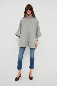 The Grey Full Zip Huntington Cape is a closet must-have for the cold-weather months. The oversized silhouette makes this the perfect layering piece, and the zip closure allows this to be worn on its own or over a button-down. With a wool blend, you are sure to be comfy and cozy in this stylish look- pair with denim and loafers or with a dress and boots for an absolutely elegant outfit. Ribbed stand collar Long poncho sleeves Tonal button at inside of sleeve Gold-tone front zip closure Cape silho Long Poncho, Dress And Boots, Kids Sale, Oversized Silhouette, The Grey, Elegant Outfit, Layering Pieces, Stand Collar, Cold Weather