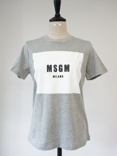 Short sleeve T-shirt with front color block panel and print detail, MSGM Milano. 100% cotton. Model is in MINUSEY ONE SIZE. ✔️ Free worldwide express shipping over $100✔️ Loved by 6,500+ customers✔️ Limited edition collections, maximum style⠀⠀⠀⠀⠀⠀⠀⠀⠀Stay ahead of the trend with can’t-find-anywhere-else staples. Your closet will thank you 💕 * MINUSEY ONE SIZE = EU 34-38, US 2-6* 100% Cotton* Dry clean* Made in Korea - Model Height: 170cm/5'7" (US2, EU34) Gray Color Block Short Sleeve Top, Contrast Graphic Print Short Sleeve Top, Contrast Color Graphic Print Short Sleeve Top, Casual T-shirt With Contrasting Colors And Graphic Print, Gray Cotton T-shirt With Logo Print, Gray Color Block T-shirt With Short Sleeves, Gray Color Block Short Sleeve T-shirt, Sporty Gray Color Block T-shirt, Contrast Color Cotton Short Sleeve T-shirt