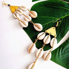 Cowrie Shell Dangle Earrings, Bohemian, Ethnic, African Jewelry Cowrie Shells And Solid Brass, 4.5" Length, 14 Shells Total. Questions? Leave A Comment Below! Cowrie Jewelry, Shell Embellishment, Cowrie Shell Earrings, Cowrie Shell Jewelry, Adornment Jewelry, Oval Stud Earrings, Cowrie Shells, Gold Bridal Earrings, Earrings Bohemian