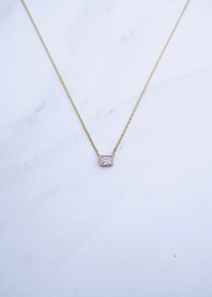 ⟡ Gold filled CZ square bezel⟡ Gold filled chain⟡ Gold filled clasp⟡ Gold filled adjustable chain from 16" to 18" Square Pendant Necklace With Adjustable Chain, Square Pendant Necklace With Bezel Setting For Gift, Necklaces With Adjustable Chain And Square Pendant, Elegant Square Necklaces With Adjustable Chain, Gold Jewelry With Bezel Setting And Square Cut, Gold Square Cut Jewelry With Bezel Setting, Gold Square Cut Bezel Set Jewelry, Bezel Necklace, Chain Gold