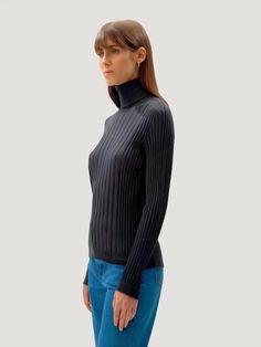 Elevate your everyday elegance with "The Extra Fine Merino Wool Turtleneck Dress," a seamless blend of Italian craftsmanship and modern knit technology. This dress offers unparalleled comfort and warmth and is crafted from 100% extra fine merino wool sourced from esteemed suppliers Zegna & Baruffa. The seamless 3D-knitwear technique ensures a regular fit that gracefully contours your body, making it an ideal choice for the discerning woman who values style and substance. The fine rib detailing a Turtleneck Style, Modern Knitting, Everyday Elegance, Turtleneck Dress, Italian Craftsmanship, Natural Cream, Wool Turtleneck, Ribbed Turtleneck, Turtle Neck Dress