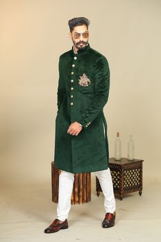 "Important Instrucitons : We request you to kindly calculate the processing time of your order after the mutual confirmation on Bespoke measurements between us has taken place (either via message , e mail or form) \"Crafted with Passion in India; loved by men across the USA, Canada, Europe\" Material: Velvet Color: Dark Green with Golden Elephant Embroidery Collar type: Mandarin , Sherwani with 7 Buttons Package contents: 1 Achkan + 1 Churidar Pajama Wash Care Instruction : Dry-clean only Achkan Embroidered Anarkali Sherwani For Reception, Traditional Full Length Sets With Intricate Embroidery, Traditional Full-length Sets With Intricate Embroidery, Fitted Sets With Intricate Embroidery And Long Shape, Fitted Long Sets With Intricate Embroidery, Traditional Full-length Embroidered Sets, Traditional Full Length Embroidered Sets, Traditional Embroidered Full-length Sets, Fitted Long Embroidered Bandhgala