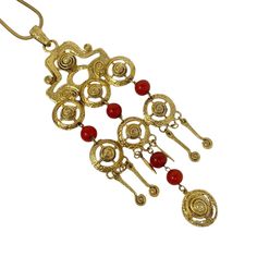 Gorgeous vintage Egyptian revival pendant necklace! Shiny gold tone with red Lucite beads Circa 1970s Measures 23 1/2" long (can be doubled as shown in photos) Pendant measures 7 1/2" long & 3" wide Excellent vintage condition.  Please enjoy! Thanks for visiting ♥ Egyptian Revival, Photo Pendant, Red Bead, Vintage 1970s, Red Gold, Jewelry Necklace Pendant, 1970s, Gold Tones, Jewelry Necklaces