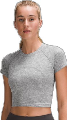 Lululemon Go-dry Short Sleeve T-shirt, Functional Short Sleeve Activewear In Athletic Heather, Breathable Tops With Medium Support From Recycled Polyester, Lululemon Functional Short Sleeve Activewear, Lululemon Moisture-wicking Short Sleeve Top, Lululemon Functional Short Sleeve Tops, Functional Lululemon Activewear, Functional Short Sleeve Lululemon Activewear, Versatile Breathable Tops In Recycled Polyester