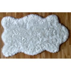 Super soft and dense faux fur rug- snow white color.  Round- 5 ft. x 5 ft.  Faux suede backing.  Machine Wash- cold water, lay flat to dry. Faux Fur Area Rug, Faux Fur Rug, Low Pile Carpet, Fur Rug, 6x9 Rugs, Rug White, Sheepskin Rug, Shag Area Rug, Sisal Rug