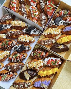 four boxes filled with different types of pastries