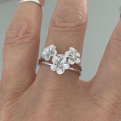 Sterling Silver Satin Plumeria Flower Ring With Only One Cz, Plumeria Ring, Silver Rings, Floral Ring, Flower Ring, Hawaii Ring, 925 Stamped, Boho Ring, Cz Ring Face Height: 13 Mm (0.52 Inch) Finish: Satin Material: 925 Sterling Silver Chandi Rings Design, Plumeria Ring, Silver Jewlery, Silver Flower Ring, Rings Unique, Ring Flower, Floral Ring, Rings Silver, Toe Ring