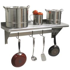 a shelf with pots and pans hanging from it