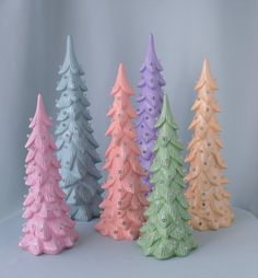 small ceramic christmas trees in pastel colors