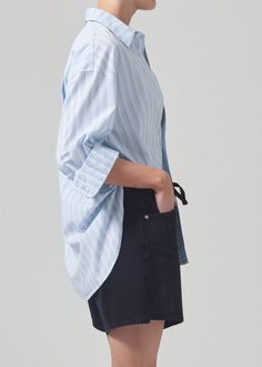 Our Kayla Shirt is a must-have for every wardrobe. An oversized silhouette and high-low hem give new dimension to a timeless staple. This fit is intended to be relaxed. Size down for a closer fit. Looks Like: Baby blue and white stripeFeels Like: Ultra-lightweight cotton maternity Oversized Effortless Shirt With Shirttail Hem, Relaxed Fit Tops With Curved Hem For Daywear, Oversized Shirttail Hem Shirt For Layering, Casual Tops With Curved Hem For Daywear, Oversized Shirt With Shirttail Hem For Layering, Curved Hem Tops For Daywear In Spring, Oversized Blouse With Rolled Sleeves And Shirttail Hem, Relaxed Fit Curved Hem Tops For Work, Relaxed Fit Workwear Tops With Curved Hem