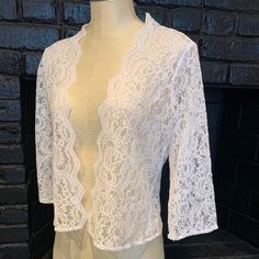 Perfect For A Wedding/Event Over Sleeveless Or Strapless, This Piece Is A Cardigan Jacket Style In A Beautiful White Lace. 3/4 Length Sleeves. No Buttons Or Snaps Or Zippers. Will Fit Size 4-6 Carmen Marc Valvo, Lace Cardigan, Cardigan Jacket, Wedding Event, Lace Tops, Jacket Style, White Lace, Wedding Events, A Wedding