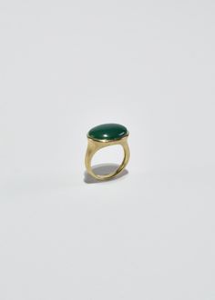 Vintage gold vermeil ring with polished oval jade cabochon. Stamped 925, China, LIRM. Material: Sterling silver, gold vermeil, jade. We recommend storing in a dry place and periodic polishing with a cloth. Modern Oval Jade Jewelry, Modern Oval Jade Ring, Oval Jade Rings In Yellow Gold, Oval Brass Rings With Polished Finish, Elegant Oval Brass Dome Ring, Timeless Green Oval Signet Ring, Jade Rings With Polished Finish, Oval Cabochon, Jade Rings With Polished Finish In Oval Cabochon Shape, Jade Oval Cabochon Rings With Polished Finish