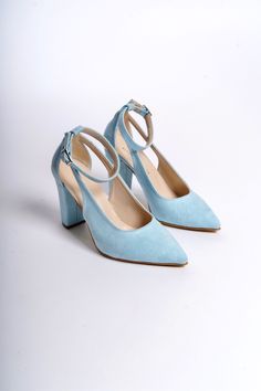 BLUE SUEDE SHOES, BLUE WEDDING SHOES, BABY BLUE SHOES, BLUE HIGH HEELS, WEDDING HEELS, BLUE BLOCK HEELS, BLUE BRIDAL SHOES, ANKLE BRIDE HEELS

As Eleanor Louise, we stand out with our Baby Blue heeled shoes that combine style and comfort. Specifically designed for brides, these shoes are crafted with high-quality materials.

• Made from Blue Suede and Premium Vegan Leather, our shoes are equipped with an ankle strap that provides comfort throughout the day.

• Completing your style and boosting your confidence is the most elegant way! Blue Suede 3.15-inch (8 cm) high-heeled shoes offer elegance and chicness with every step. Whether it's for daily wear or a special event, these shoes not only add height but also provide a sophisticated touch to your style. Light Blue Open Heel Strap Heels, Light Blue Open Heel Heels With Strap, Light Blue Block Heels With 4-inch Heel, Blue Pointed Toe Wedding Shoes For Spring, Spring Wedding Shoes Blue Pointed Toe, Elegant Blue Open Heel Wedding Shoes, Elegant Blue Wedding Shoes With Open Heel, Blue Open Heel Wedding Shoes For Evening, Elegant Blue Wedding Shoes For Spring