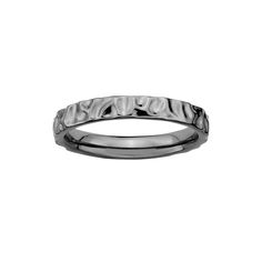 a white gold wedding band with an intricate design