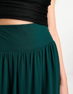 Skirts by TFNC Lower-half looks High rise Shirred, stretch panel Back zip closure Regular fit Green Non-stretch Pleated Maxi Skirt, Non-stretch Solid Maxi Skirt, Green Non-stretch Skirt With Elastic Waistband, Green Stretch Skirted Bottoms, Green Skirt With Elastic Stretch Waistband, High Waist Stretch Pleated Skirt With Elastic Waistband, High Waist Stretch Green Skirt, Green Stretch Flared Skirt, Green High Waist Stretch Skirt