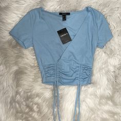 Brand New Tags On Cropped V Neck Sky Blue Adjustable Strings Ruched Detail Blue Trendy Crop Top For Spring, Trendy Blue Crop Top For Day Out, Trendy Blue Crop Top For Spring, Forever 21 Trendy V-neck Crop Top, Forever 21 Blue Cropped Tops, Trendy V-neck Crop Top By Forever 21, Chic Blue Forever 21 Top, Blue Casual Crop Top For Night Out, Casual Blue Crop Top For Night Out