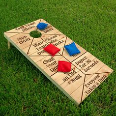 a wooden board game with red and blue pieces on it