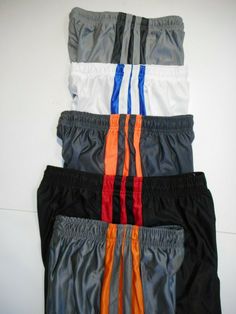 Boys Shorts, Sports, Baseball, Basketball, Soccer, Outfits Boys Cool Shorts come in 3 colors, long legged shorts, 2 pockets, elastic waistband with tie string, Slick Material 100% Polyester. Size Available   Medium 10-12 Color Choice  Medium Gray/Orange, Dark Gray/Orange, White/Blue, Medium Gray/Dark Gray Brand New with Tags By Brooklyn Unlimited BUY 3 Pairs Get the 4th Pair FREE !!  (Mix n' match any on my site) Measurements are approx. Any color variation is due to lighting. We ship daily. All Cool Shorts, Soccer Outfits, Soccer Shorts, Get Free Stuff, Boys Shorts, Sports Baseball, Nice Shorts, Mix N Match, Boy Shorts