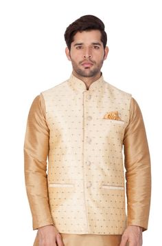 Vastramay brings to you this Stylish yet Comfortable Men Gold Men Woven Jari Jaquard Blended Cotton Modi Jacket. Adorn it for a perfect Classy and Trendy look. Pair it with a juti or a mojari for the Royal look. Product Features : Top Color: Gold Top Fabric: Cotton Blend Lining Material: Cotton Satin Product Type: Modi Nehru Jacket Hemline: Straight Fabric Purity: Blended Weave Pattern: Jacquard Placket: Button Placket Collar: Mandarin Collar Sleeves: Sleeveless Christmas Father, Nehru Jacket, Man Weave, Royal Look, Nehru Jackets, Woven Jacket, Ethnic Dress, Mens Wear, Woven Top