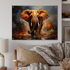 an elephant painting on the wall above a couch in a living room with a lamp