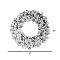 a christmas wreath is shown with measurements for the size and shape, as well as how to measure it