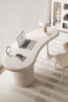 a laptop computer sitting on top of a white desk next to a chair and lamp