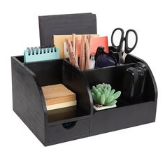 a black desk organizer with pens, pencils, and other office supplies in it