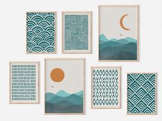 six framed art pieces with mountains and waves