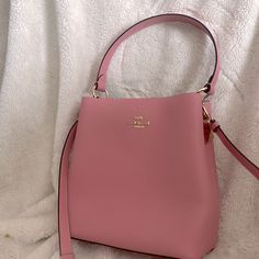 Just Sat In My Closet For A Year Or Two. Great Condition, Plastic Still On Zipper, And Never Used! Tags And All Packaging Have Been Thrown Out. Elegant Bucket Bag With Detachable Strap For Shopping, Formal Bucket Bags With Removable Pouch, Feminine Top Handle Shoulder Bag, Elegant Bucket Satchel With Detachable Handle, Elegant Bucket Bag With Removable Pouch, Elegant Bucket Shoulder Bag With Removable Pouch, Elegant Bucket Satchel For Shopping, Classic Pink Evening Bag, Classic Pink Evening Bags