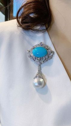 Luxury Turquoise Brooches, Elegant Jewelry Brooch, Elegant Wedding Brooch With Cabochon Detail, Luxury Turquoise Brooches For Gift, Elegant Blue Oval Brooches, Elegant Oval Blue Brooches, Elegant Oval Gemstone Brooches, Turquoise Brooch For Formal Occasions, Elegant Pendant Brooch With Cabochon