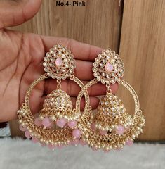 *Light Weighted Gold earrings tikka set. *Earrings length: 4 inches  (with drops)  *Width : 2.4 inches Pink Danglers With Latkans, Pink Round Jhumkas For Festivals, Pink Jhumkas For Festivals, Pink Heavy Jhumkas For Gift, Pink Tikka With Latkans For Festivals, Pink Chandbali Bollywood Tikka, Bollywood Style Pink Chandbali Tikka, Pink Dangle Jhumkas For Festivals, Pink Dangle Chandelier Earrings With Latkans