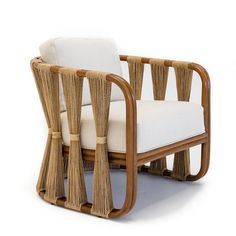 the chair is made out of wood and has white cushions