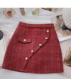 Red Knee-length Skirt With Pockets, Chic Red Asymmetrical Skirt, Red Knee-length Mini Skirt, Chic Red Knee-length Mini Skirt, Red Office Skirt For Spring, Red Knee-length Skirt For Fall, Red Knee-length Bottoms For Fall, Trendy Red Knee-length Skirt, Red Lined Asymmetrical Skirt