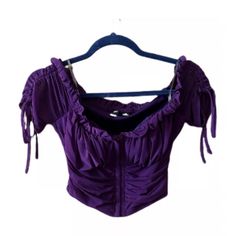 Ruched Corset-Style Crop Top From Windsor. Its Rich Purple Hue And Figure-Flattering Design Make It A Perfect Choice For A Night Out Or A Chic Event. Size Small, It Fits True To Size And Features Adjustable Drawstrings For A Custom Fit. The Cropped Length Pairs Beautifully With High-Waisted Jeans Or Skirts Dark Purple Corset Top, Purple Fitted Top With Smocked Bodice, Fitted Purple Top With Smocked Bodice, Purple Top Outfit, Purple Tube Top, Purple Corset, Cropped Corset, Pixie Hollow, Purple Crop Top