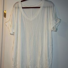 Nwot. V-Neck Tee With Roll Up Short Sleeves. 95% Rayon, 5% Spandex. Kind Of Looks Like An Off-White Color. Casual White Stretch V-neck Top, Oversized White V-neck Top, Basic V-neck Loungewear Tops, Chic Soul, Babydoll Shirt, Flamingo Shirt, Navy Blue Blouse, Off White Color, Crew Neck Shirt