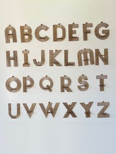 the letters and numbers are made out of wood