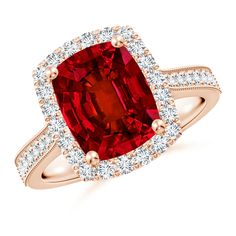 a red diamond ring with diamonds surrounding it