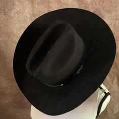 100% Wool. Made In The Usa. Very Nice. Black Flat Bill Hat For Ranch, Flat Bill Black Hat For Rodeo, Wide Brim Black Hat For Ranch, Black Wide Brim Hat For Ranch, Black Flat Bill Felt Hat For Country Events, Black Flat Bill Hats For Country Events, Black Short Brim Hat For Ranch, Black Top Hat For Fall Rodeo, Black Short Brim Felt Hat For Ranch