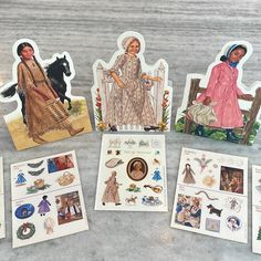 several cards with pictures of people and animals on them, all in different styles or shapes