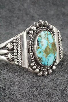 Southwestern Turquoise Sterling Silver Cuff Bracelet, Southwestern Style Turquoise Bracelet Stamped 925, Turquoise Western Style Collectible Bracelets, Western Turquoise Bracelet With Patina, Turquoise Sterling Silver Bracelet With Patina, Southwestern Sterling Silver Bracelet With Turquoise Inlay, Southwestern Turquoise Inlay Sterling Silver Bracelet, Southwestern Style Turquoise Inlay Bracelets, Southwestern Turquoise Inlay Bracelet